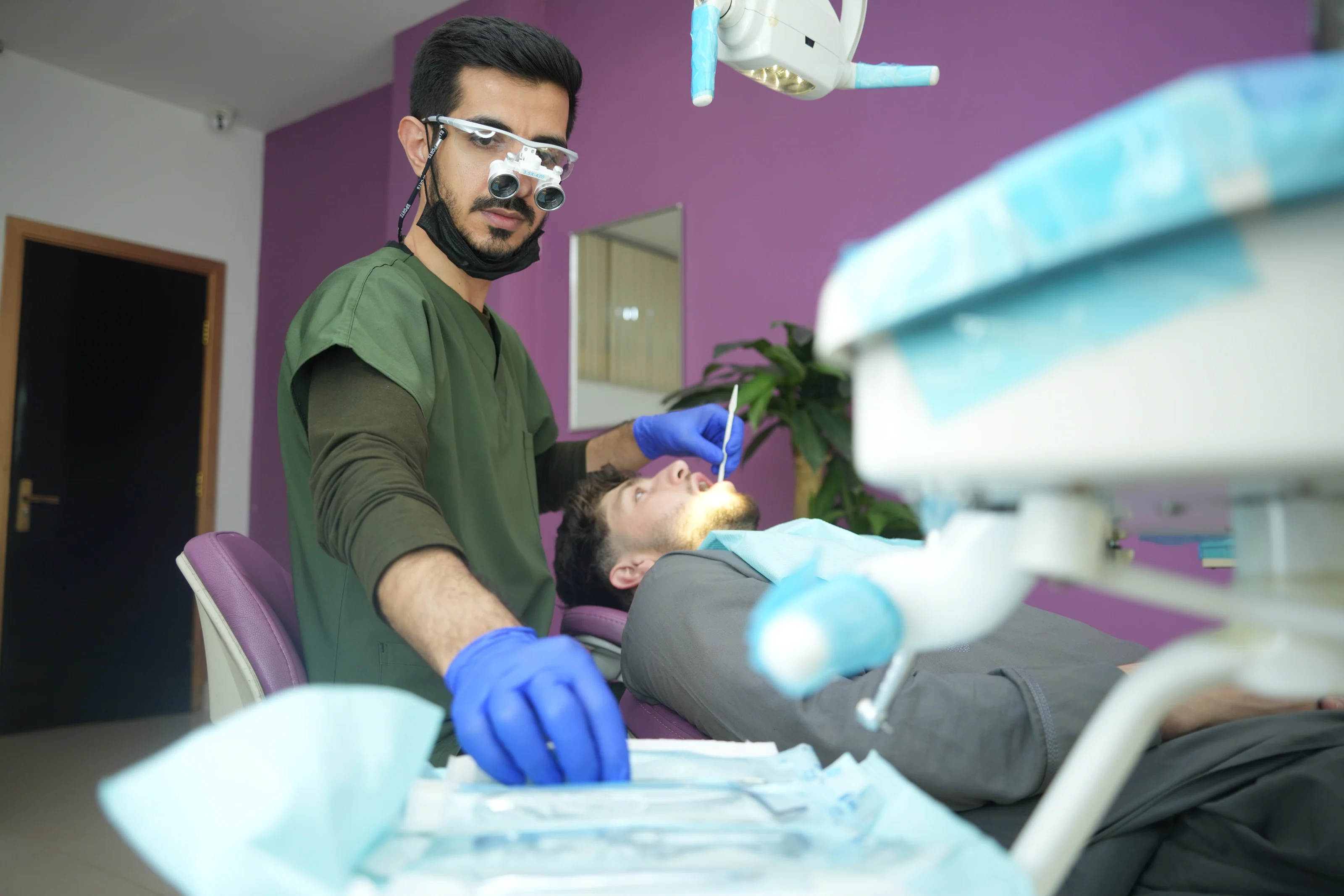 Treatment room with Dr. Arash Kiumars at work